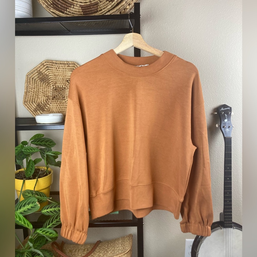 MAGASCHONI size M super soft stretchy shirt with bell sleeves